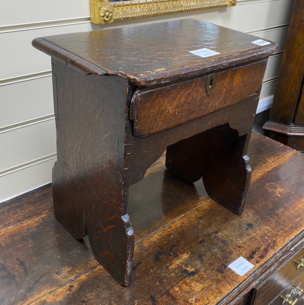 An 18th century oak stool, fitted drawer, width 38cm, depth 24cm, height 38cm